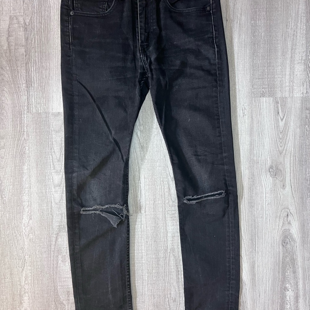 Levi's Black Skinny Jeans with Modern Knee Distressing